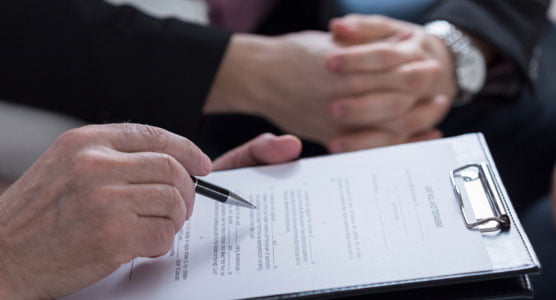 Choosing a Wholesale Headstone Supplier: 6 Things 2 signing paperwork
